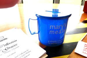 We had one of their collection boxes at our mueetings for the last few years A Mary's Meals collecting box in the shape of cup